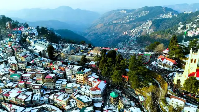 Aerial view of snow-dusted Shimla town and Christ Church on the Ridge