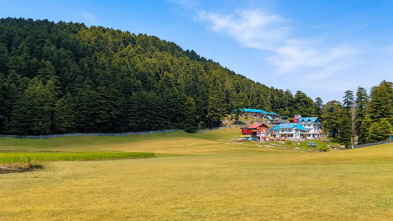 Grassy Khajjiar meadow with deodar forest and a hotel near Dalhousie