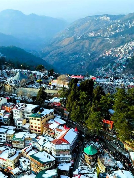Aerial view of snow-dusted Shimla town on the hills