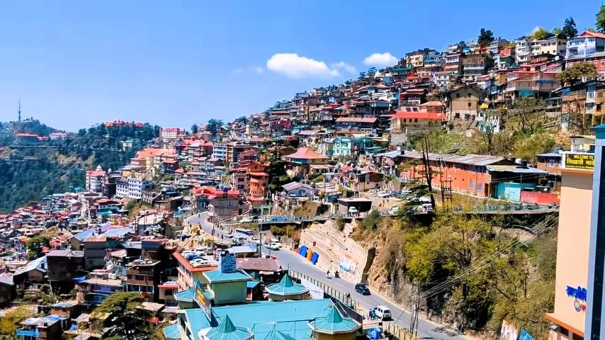 Colourful houses and hotels on the Shimla hillside