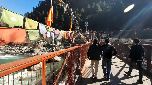 Prayer-flag bridge over the Parvati River at Manikaran