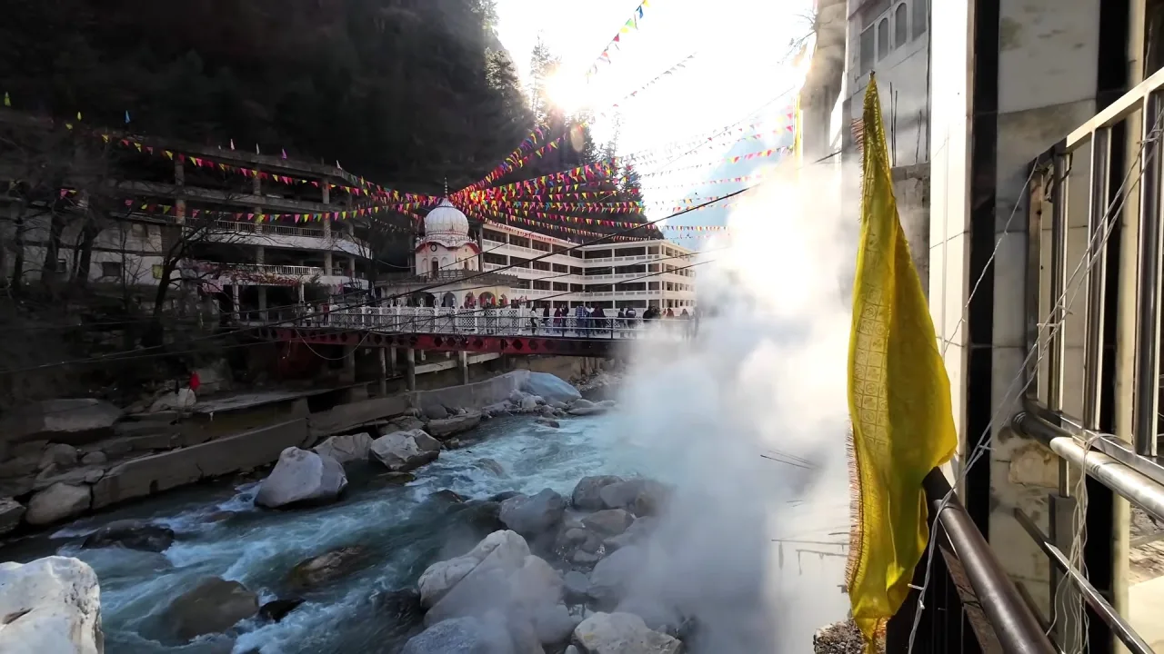 Hot spring steam over the Parvati River below Gurudwara Manikaran Sahib