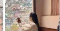 Guest at a hotel window overlooking a hill town, from Mahib Online Services' Google review